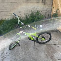 Green bike, for child.