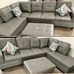 Silver Gray Leather Sectional Couch And Ottoman 
