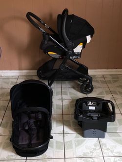 PRACTICALLY NEW EVENFLO PIVOT MODULAR TRAVEL SYSTEM STROLLER CAR SEAT AND BASSINET 3 IN1