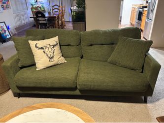 Green couch, love seat, and chair
