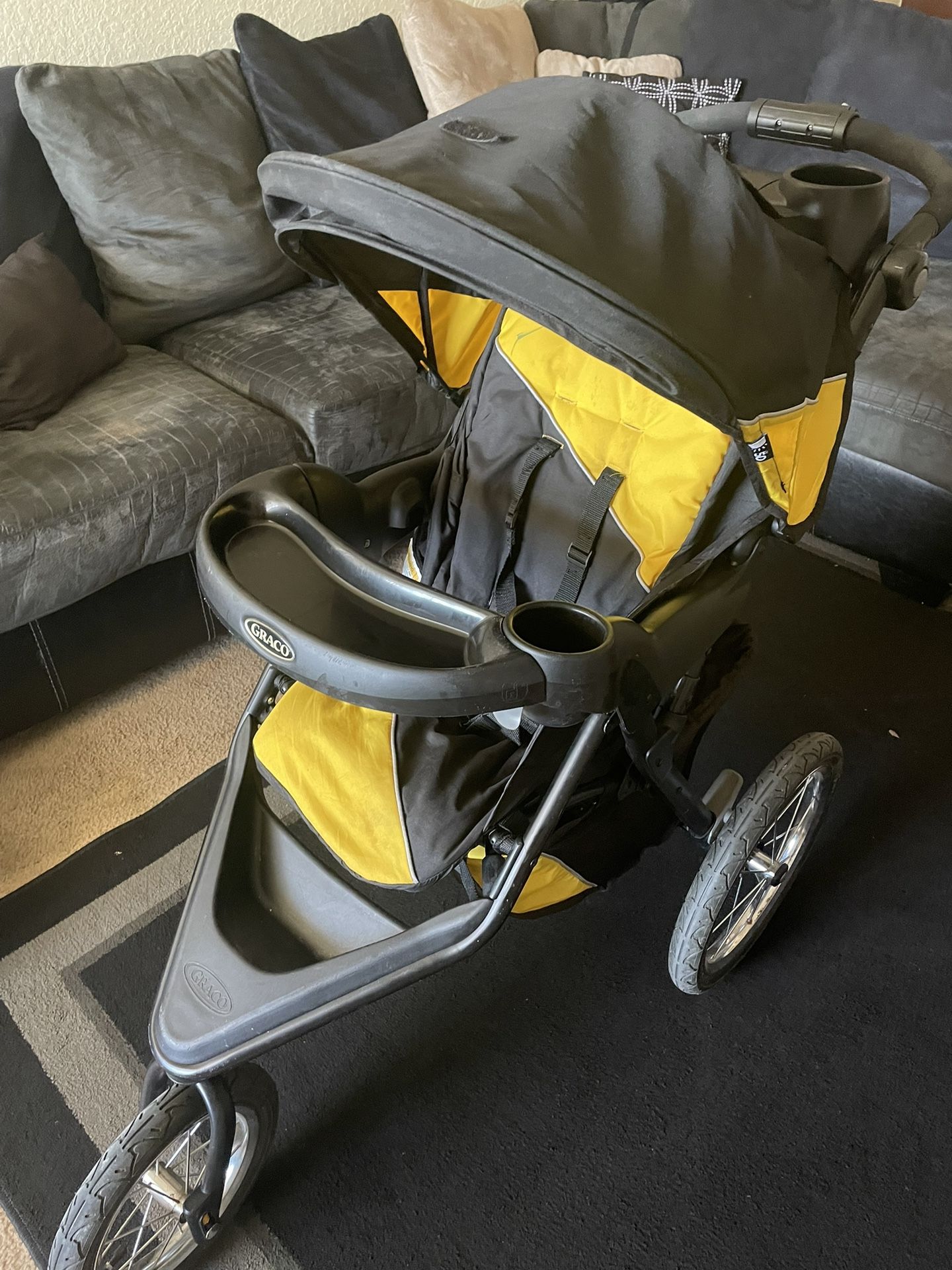 Graco jogging stroller yellow and black for Sale in San Antonio TX OfferUp