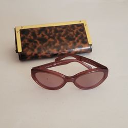 Tory Burch TY 7040 Sunglasses Burgundy Oval Cat Eye 1053/14 57x19x135 
w/Case. Pre-owned, good shape, minor scratches that should not impact 
your vis