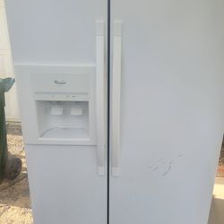 Whirlpool side by side refrigerator.