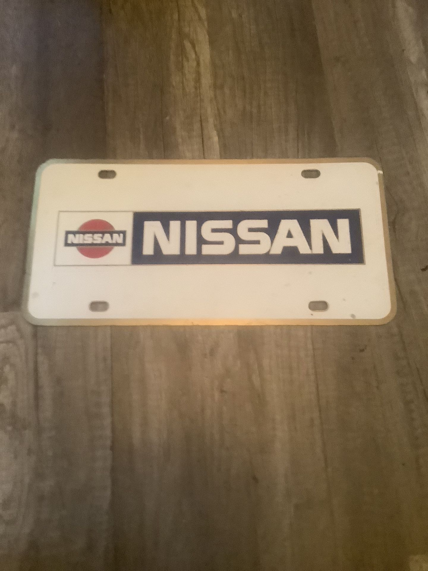 Vintage Brass Nissan Plate 