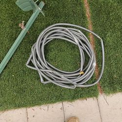 Very long garden hose and hanger