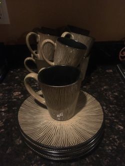 Nice set coffee mugs and plates