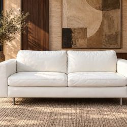 NATUZZI WHITE ITALIAN LEATHER SOFA • 82” • $825