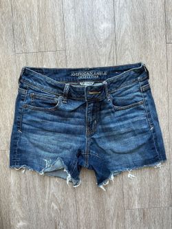 American Eagle Women's mid rise dark wash distressed demin shorts