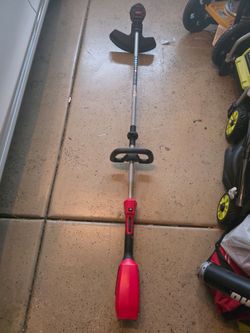 BRAND NEW MILWAUKEE TRIMMER