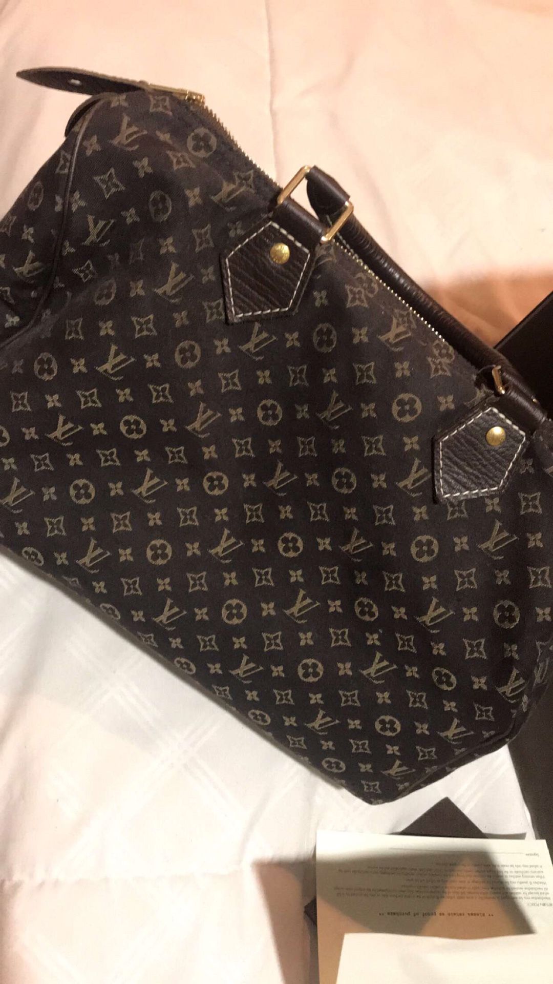 Louis Vuitton women’s hang bag