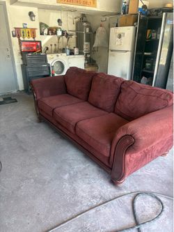 Sofa burgundy  good cond.