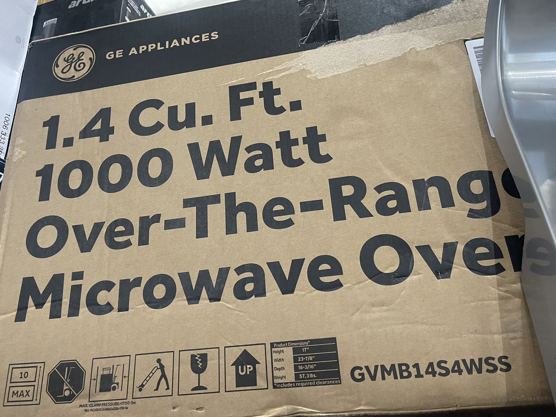 GE 24 in. 1.4 cu. ft. Over-The-Range Microwave Oven in Stainless Steel with Sensor Cooking Store SKU# 1013-083-453