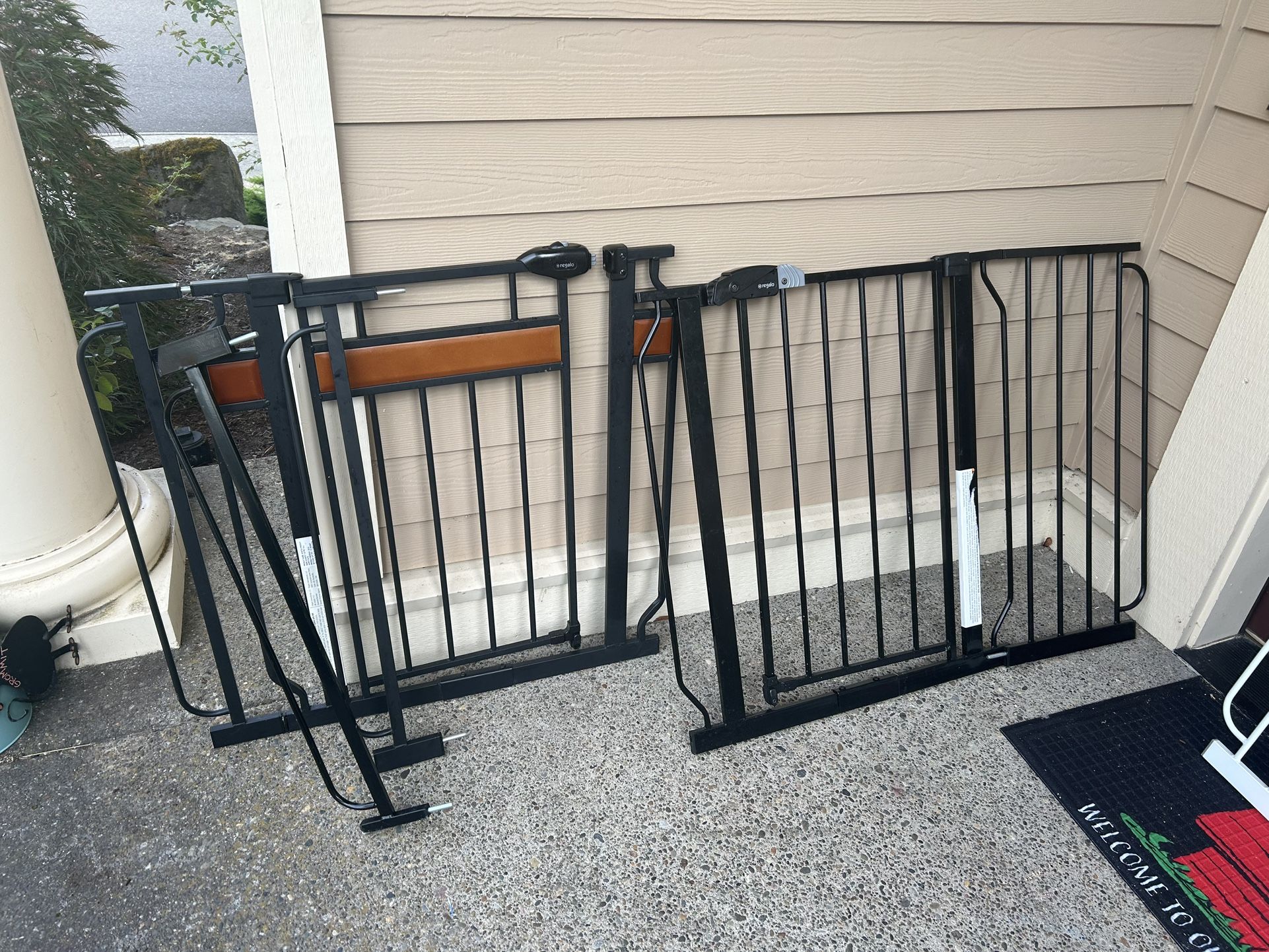 2 Wide baby gates.  2 For $50 Or $30 Each