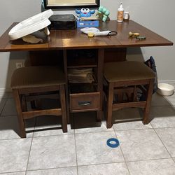 Wooden table with 4 wooden chairs