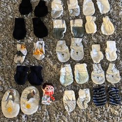 Newborn baby mittens and one pair of newborn baby shoes