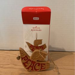 Hallmark keepsake Christmas ornament on wings of peace K16