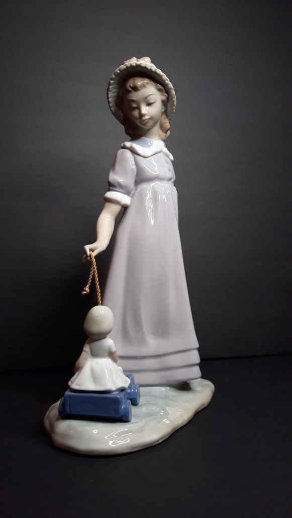 Lladro #5044 - Girl With Wagon figurine