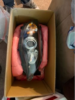 2011 Subaru Impreza hatchback stock headlights