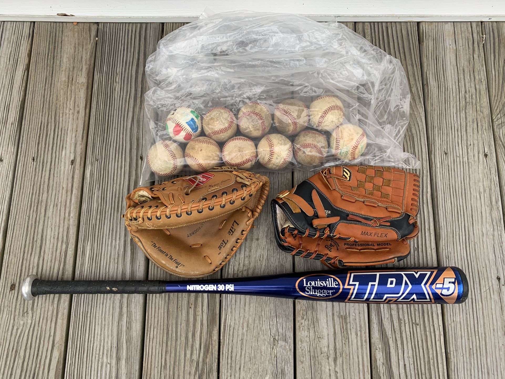 Baseball Bat, Gloves And Balls