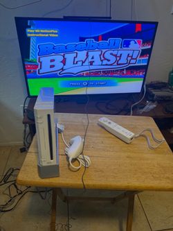 Nintendo Wii Console with Remote and Nunchuk