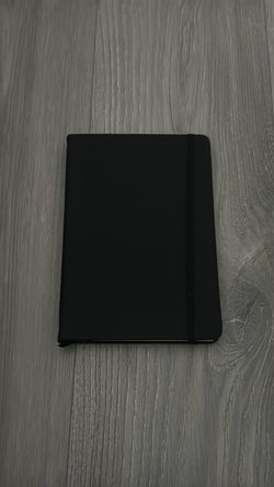 Black Hard-Cover Lined Notebook.