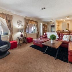 Tufted Faux Red Leather L-Sectional Bumper Chaise With Ottoman