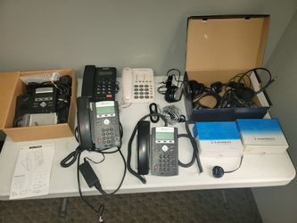 Lot Of Phones And Phone Headsets
