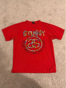 Vintage Stüssy “World Tribe: Rags to Riches” graphic tee