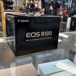 Canon R100 camera With 18-45mm Lens New