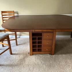 Counter Height Expandable Table And 8 Chairs 