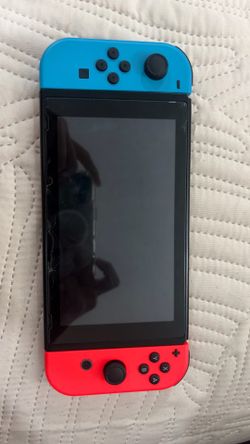 Used Nintendo Switch from 2018 with screen protector