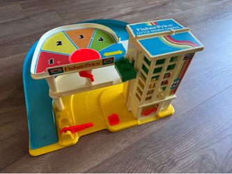 Fisher-Price Little People Helpful Neighbor's Garage Playset.