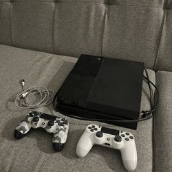 PS4 (including charging cord, 2 Controllers and Games)