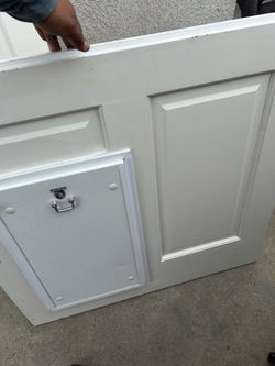 Back door with open half door with doggie door