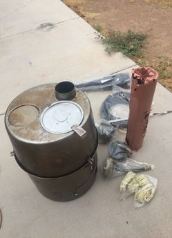 Military heater/ TM9/4520 or H-45 complete with all accessories including gas tank stand.can use multiple types of gases and solid fuel.