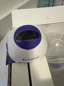 Wearable breast pump