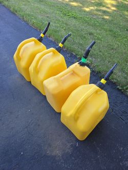 (4) 5 gallon diesel fuel cans (heating oil also)