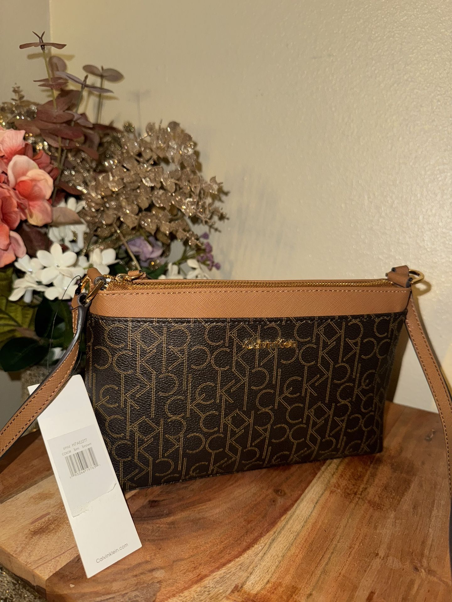 Calvin Klein CK Signature Wristlet Clutch Wallet in brown with gold hardware