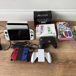 Nintendo Switch Oled + extras
