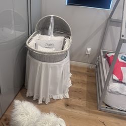 Restoration Hardware heirloom wicker bassinet