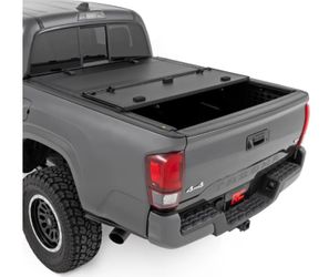 Rough Country Hard Flip-Up Tonneau Cover for Toyota Tacoma (2016-2023) - Flush Folding Aluminum Bed Cover