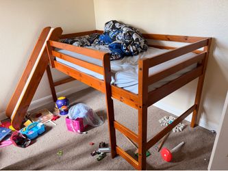 Twin bed with slide
