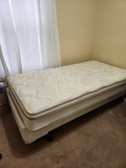 Twin Bed with Frame & Elliptical Machine both are in excellent conditionndition