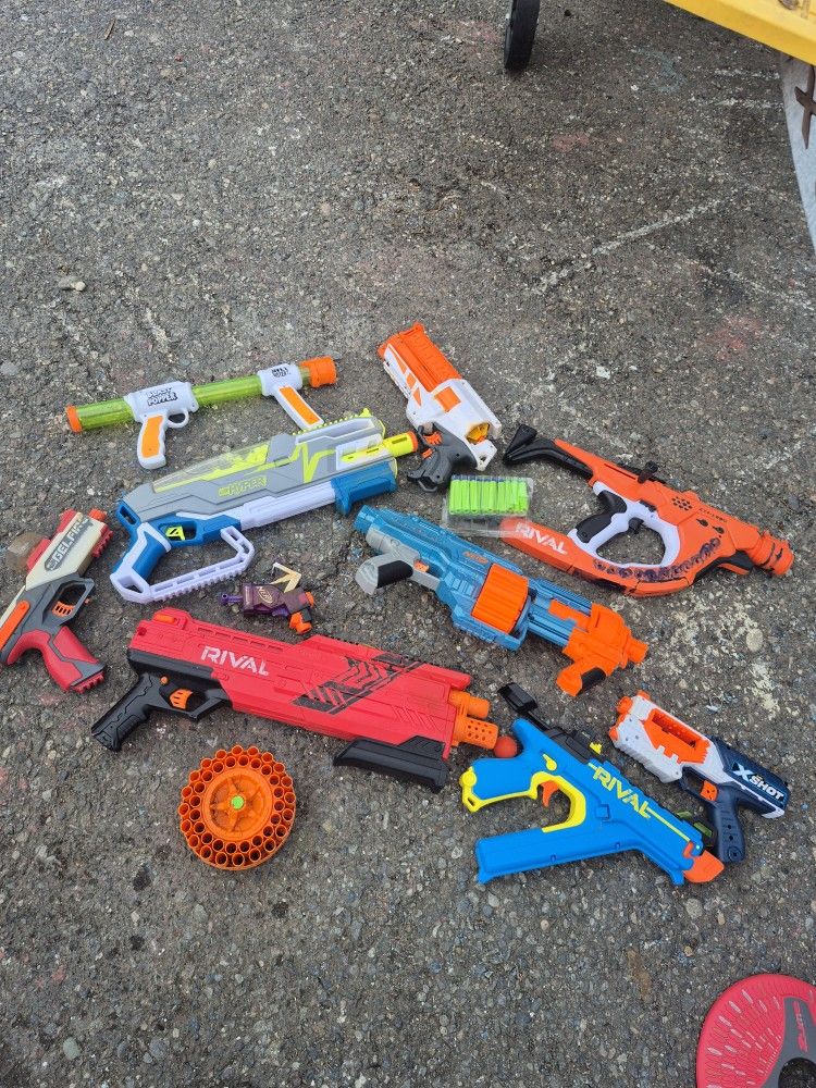 Various Nerf And Other Soft Toy Guns