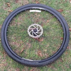 FRONT WHEEL ........( GAINT) DISC BREAK  29ER/ MOUNTAIN....... PRACTICAL NEW
