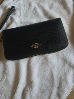 Used, black coach original wallet, slightly new, for $50