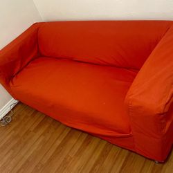 Red Couch (68in X 36in X 27in)
