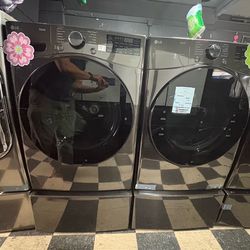 LG ThinQ washer and dryer with pedestals