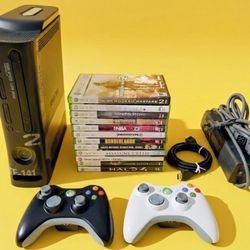 Microsoft Xbox 360 modern warfare 2 console with 2 controllers 12 games power supply