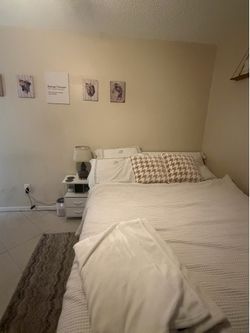 Queen bed and nightstand